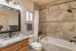 Bathroom with combo bath/shower 